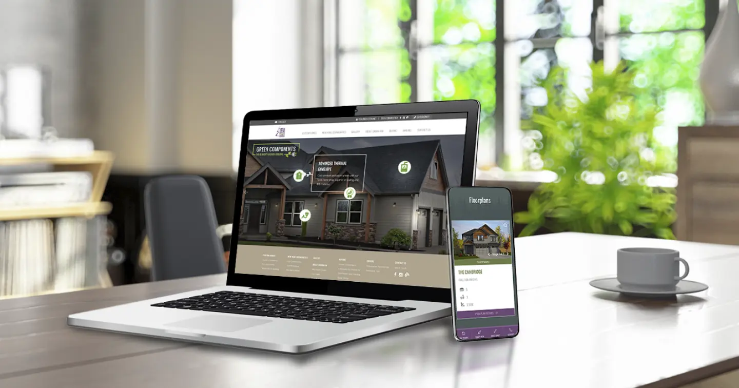 Urban Northwest Website on a laptpo and phone at a coffee shop